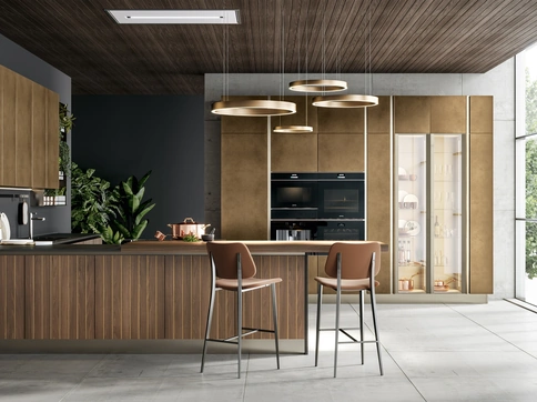 Cucina Moderna in noce e metallo liquido ossidato ottone con penisola Clover Design 04 di Lube